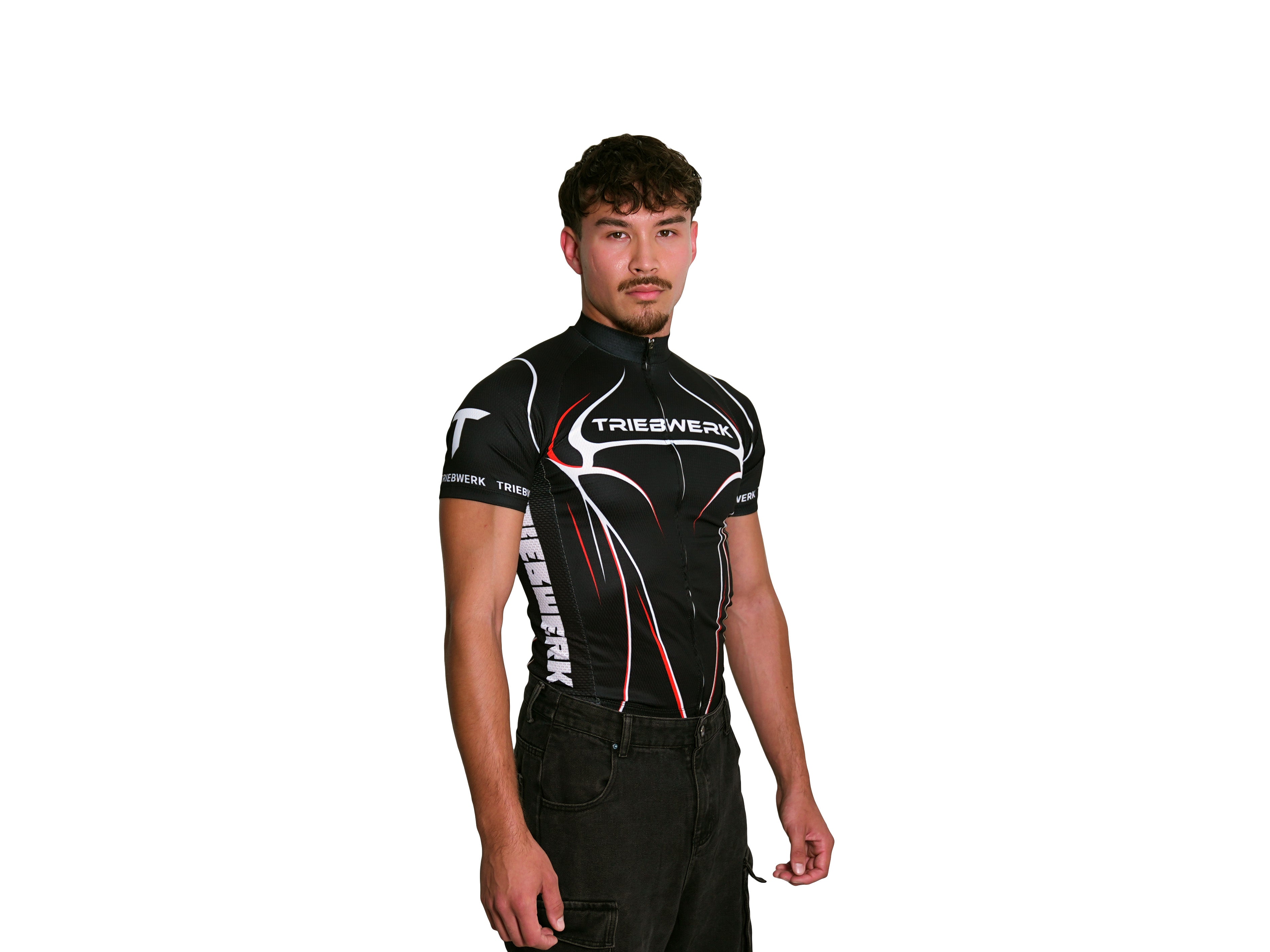 Person wearing a black cycling jersey with visible branding on a white background