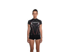 Woman wearing a black wetsuit with a brand logo on a white background